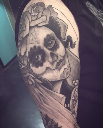 Explore cash tattoo ideas, creative tattoo ideas in San Diego, available at Sideshow Tattoo and Piercing