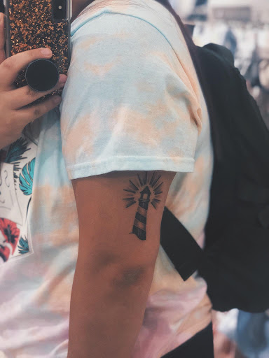 Find family symbol tattoo ideas for your next unique tattoo in Mcallen at The Ink Elephant