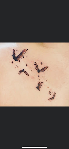 Explore dinosaur tattoo ideas for son, creative tattoo ideas in Mishawaka, available at Body Art Gallery