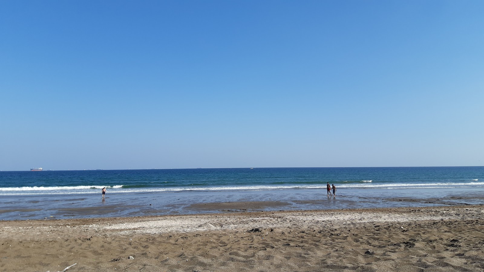 Φωτογραφία του Umbrella Beach - συνιστάται για οικογένειες που ταξιδεύουν με παιδιά