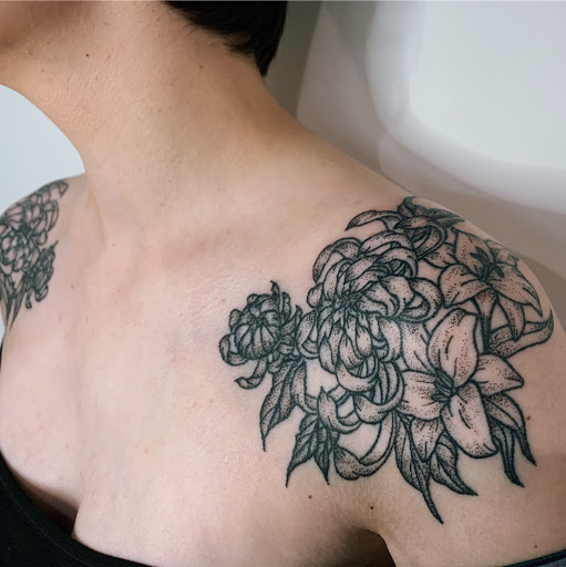 Explore feminine dragon tattoo ideas, creative tattoo ideas in Lufkin, available at Black Spot Tattoo Company