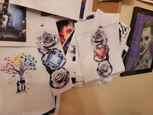 Explore rubber ducky tattoo ideas, creative tattoo ideas in Canton, available at The Inkeepers Tattoo Parlor