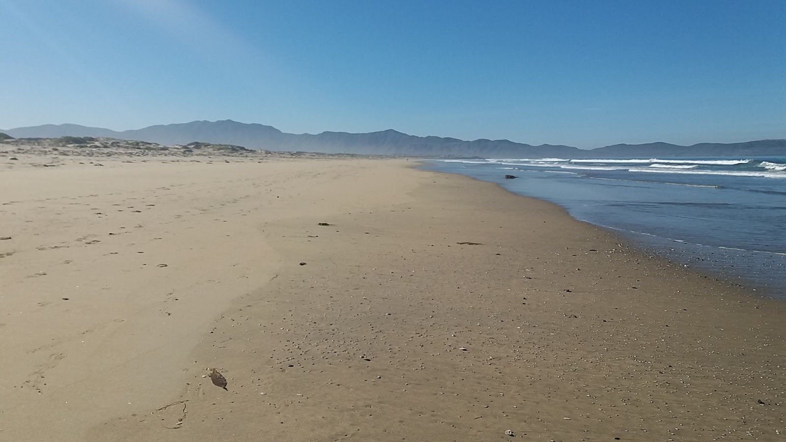 Fotografija Playa Guarnicion Militar z svetel fin pesek površino