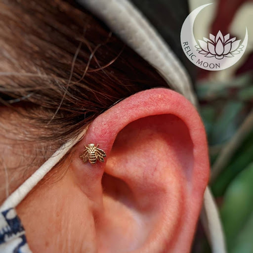 Explore lucky penny tattoo ideas, creative tattoo ideas in Coeur D Alene, available at Relic Moon Fine Jewelry & Body Piercing