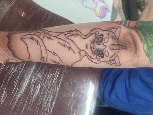 Explore women's hand tattoo ideas, creative tattoo ideas in Wickliffe, available at Distinctive Tattoo Studios