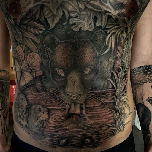 Explore stitches tattoo ideas, creative tattoo ideas in Palm Harbor, available at Angry Owl Tattoo and Piercing