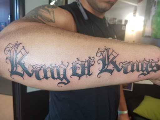 Explore dog bone tattoo ideas, creative tattoo ideas in Orange Park, available at Big City Tattoo and Piercing