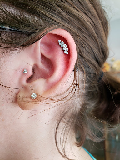 Explore two sons tattoo ideas, creative tattoo ideas in Gainesville, available at Anatomic Body Arts - Body Piercing