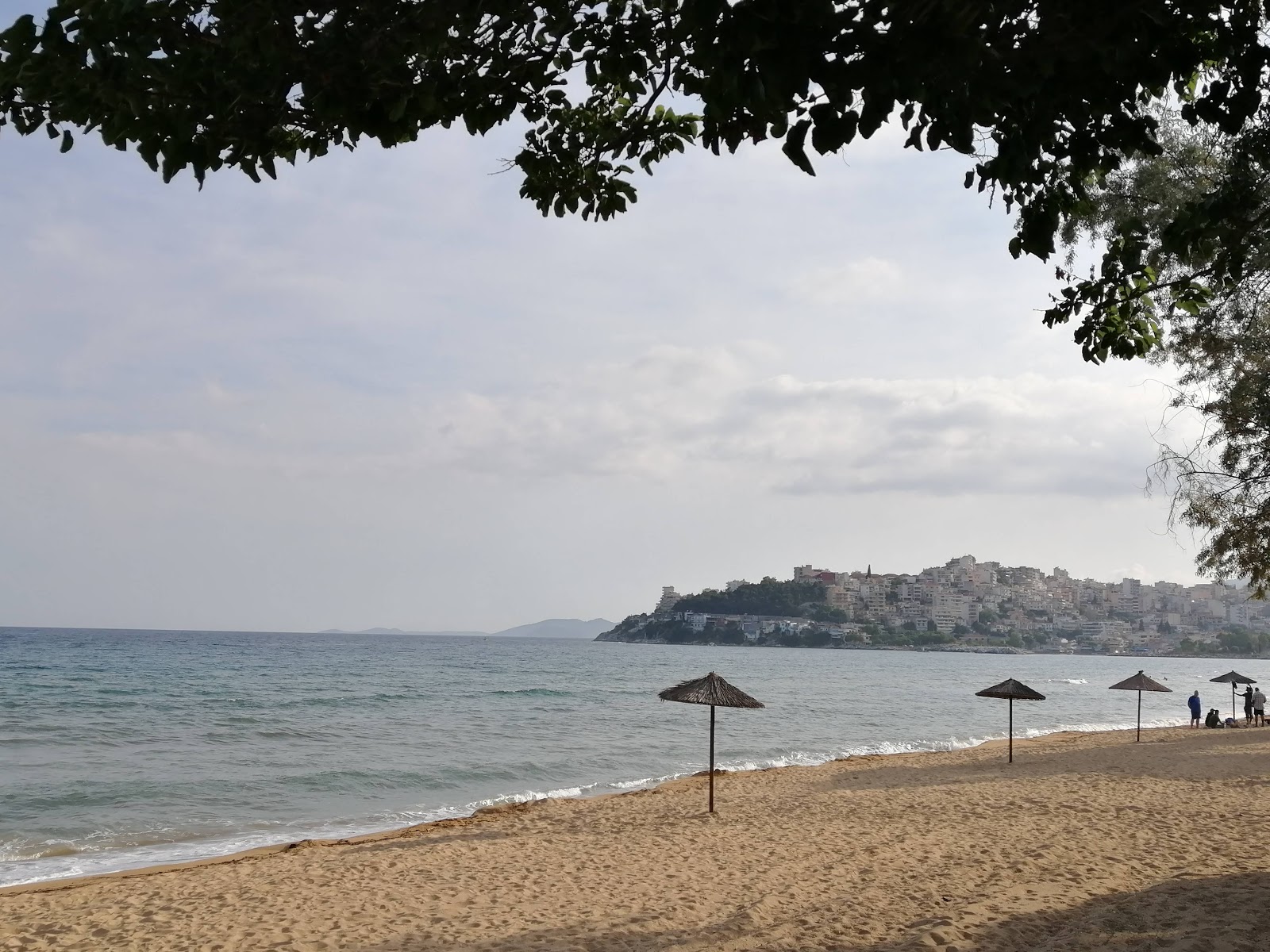 Photo de Perigiali beach avec rivage droit, long