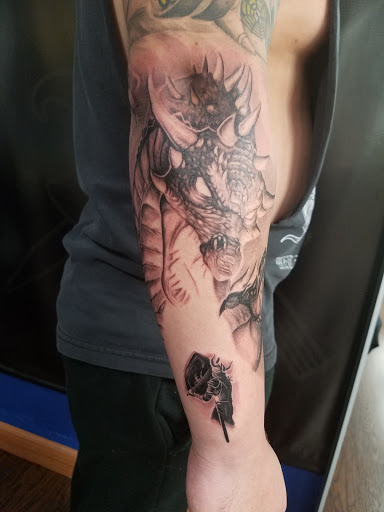 Explore small dove tattoo ideas, creative tattoo ideas in Glendale, available at Knucklehead Tattoo Shop