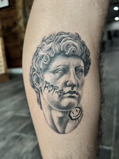 Find family symbol tattoo ideas for your next unique tattoo in Scarborough at North Coast Tattoo Company