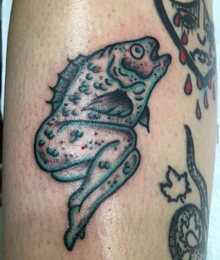 Explore july birth flower tattoo ideas, creative tattoo ideas in Kansas City, available at Grimm Tattoo and Bert Grimm Museum