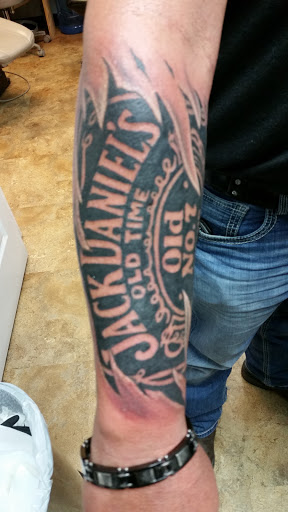 Explore dog love tattoo ideas, creative tattoo ideas in Knoxville, available at Mythical Markings Tattoo Studio