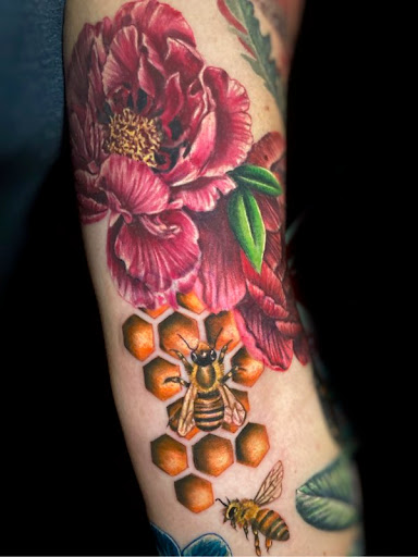 Explore gun tattoo ideas for men, creative tattoo ideas in Worcester, available at Studio 31 Tattoo Social Club