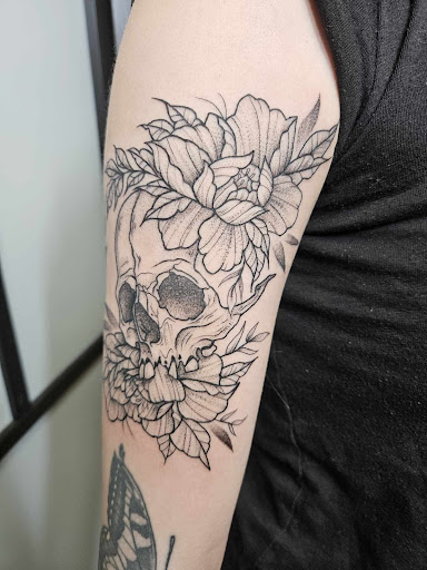 Explore marigold tattoo ideas, creative tattoo ideas in Port Orchard, available at Whimsy & Wraith Tattoo LLC