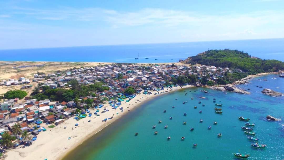 Foto av Xuan Thanh Beach med turkosa vatten yta