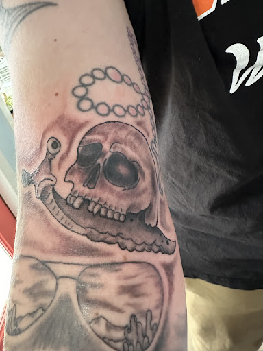 Explore tribal sleeve tattoo ideas, creative tattoo ideas in Kingsland, available at These Colors Dont Run Tattoo & Piercing