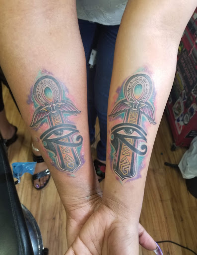 Explore dog paw tattoos ideas, creative tattoo ideas in Owosso, available at Expressions Body Art Studio