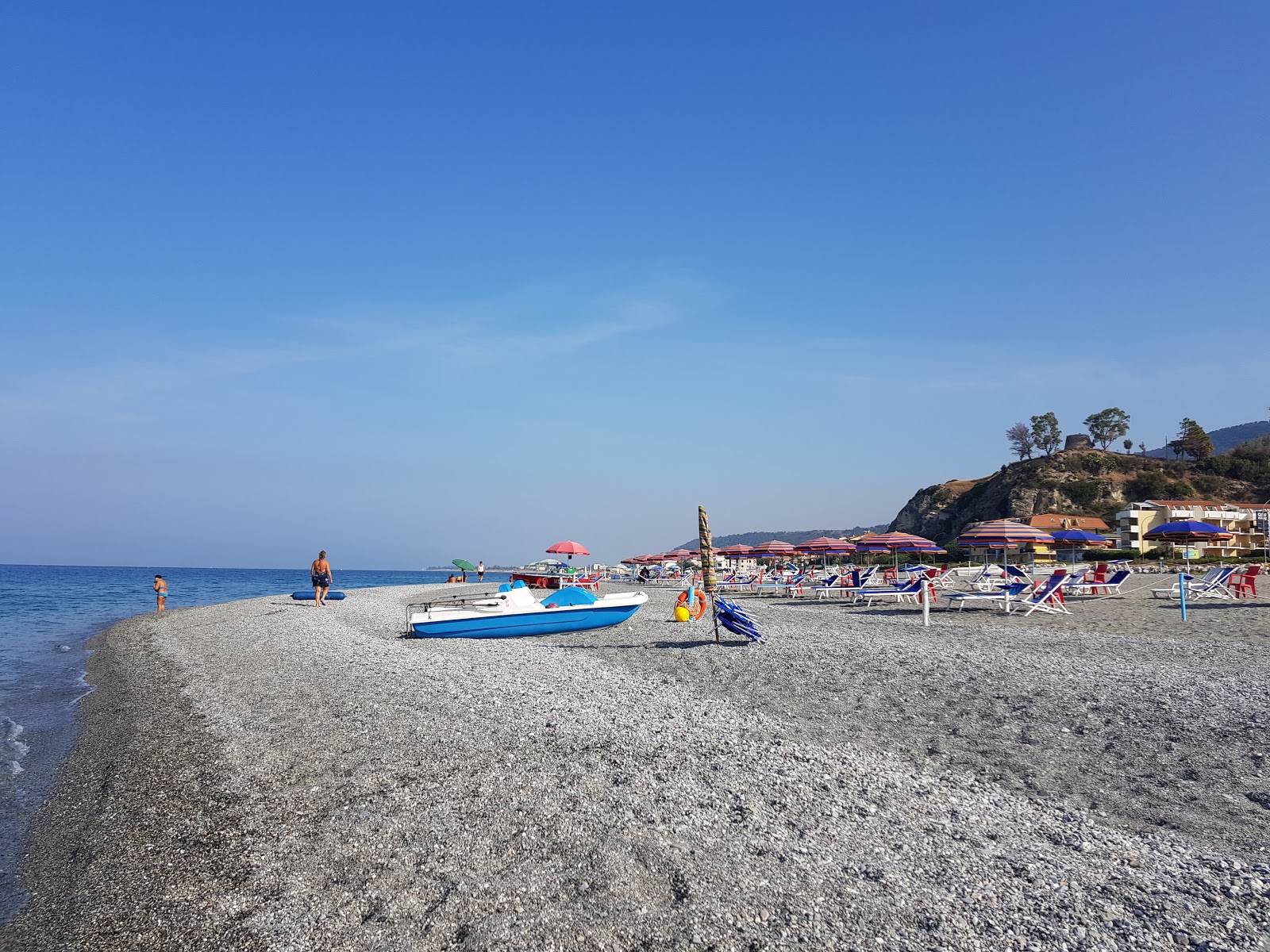 Foto di Cartolano beach con una superficie del acqua blu