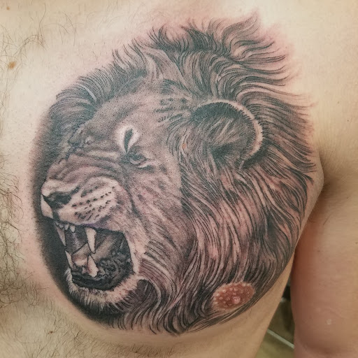 Tattoo Shop «Grapes Designs», reviews and photos, 103 S 3rd St, Scottsville, KY 42164, USA