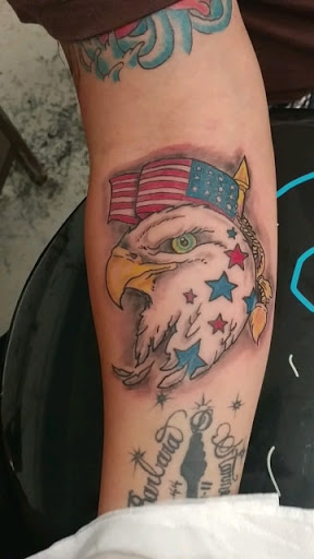 Explore male family tattoo ideas, creative tattoo ideas in Flint, available at Southern Outlaw Tattoo