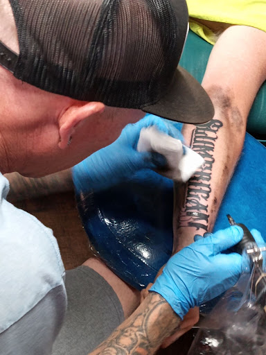 Explore king tattoo ideas, creative tattoo ideas in Grand Island, available at Smokin Joes Tattoo