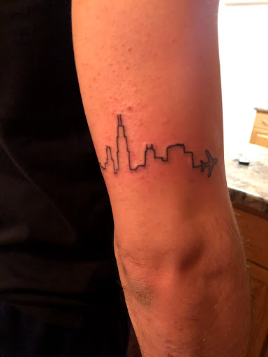 Explore back shoulder tattoo ideas for men, creative tattoo ideas in Schaumburg, available at Atmosphere Tattoo Gallery - Schaumburg