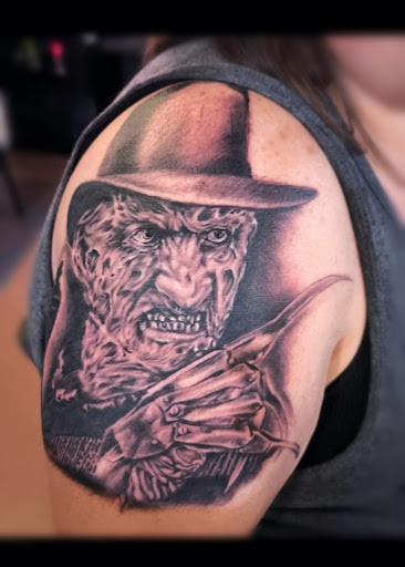 Explore daredevil tattoo ideas, creative tattoo ideas in Peoria, available at Iron Key Tattoo Studio Inc.
