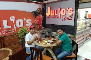 Julio´s Grill - Bar restaurante - Parrilladas de carnes y mariscos image