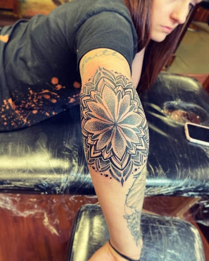 Explore brain tumor tattoo ideas, creative tattoo ideas in Williamsport, available at Moa Tattoos