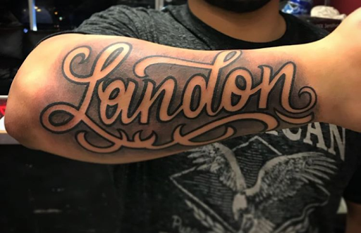 Explore wing tattoo ideas for guys, creative tattoo ideas in Fountain Valley, available at Lowrider Tattoo Studios