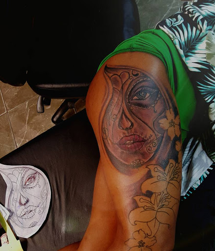 Explore finger tattoo ideas for women, creative tattoo ideas in Miami, available at Ink Rising Tattoo