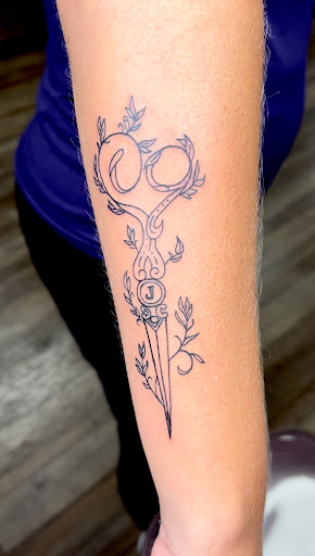 Explore acoustic guitar tattoo ideas, creative tattoo ideas in Clarksville, available at Dark Raine Tattoo