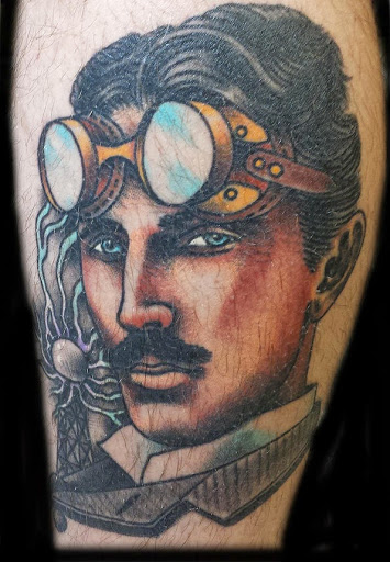 Explore olive tattoo ideas, creative tattoo ideas in Littleton, available at Think Tank Tattoo South