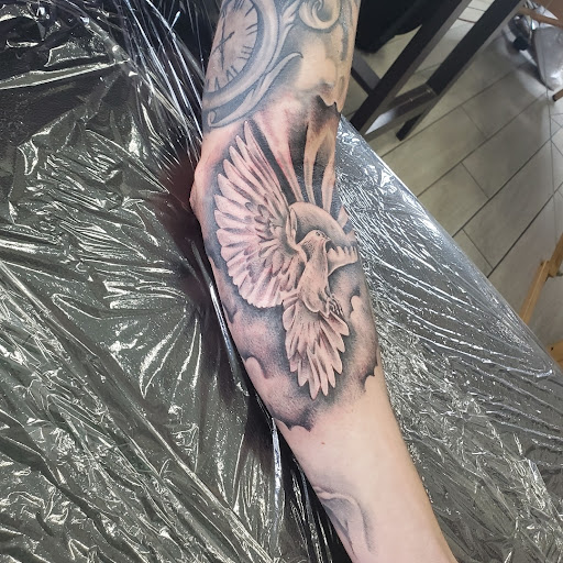 Explore beetle tattoo ideas, creative tattoo ideas in Miami, available at Tatt Em Up Tattoos & Piercings