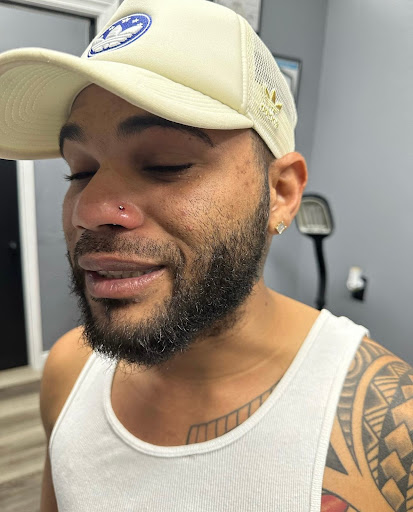 Explore shark tooth tattoo ideas, creative tattoo ideas in Fort Myers, available at Loyal 2 The Coil Tattoos & Piercings (Edison Mall Location Entrance F)