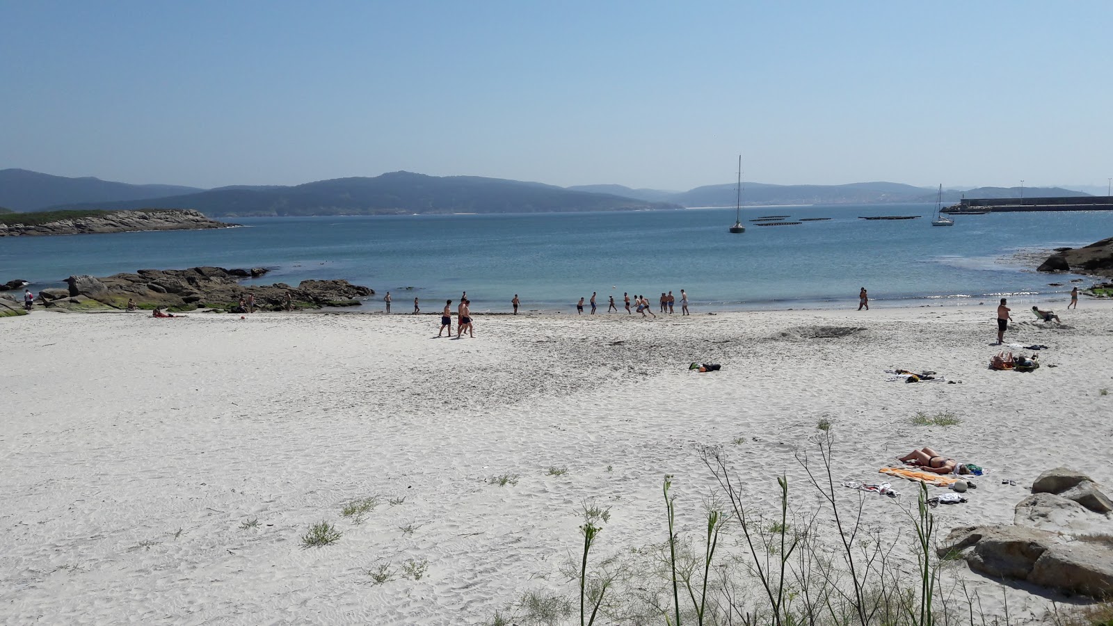 Foto van Praia do Osmo met turquoise puur water oppervlakte