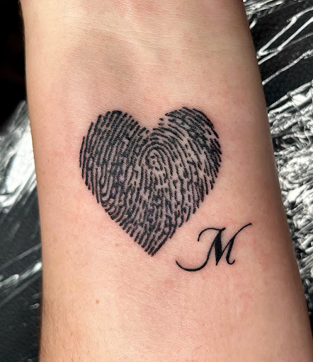 Explore firefighter tattoo ideas for guys, creative tattoo ideas in Clarksville, available at Dark Raine Tattoo