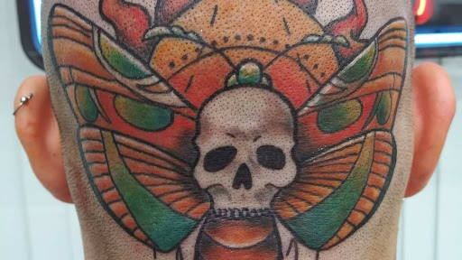 Explore brown pride tattoo ideas, creative tattoo ideas in Shelbyville, available at Stage Left Tattoo and Piercing