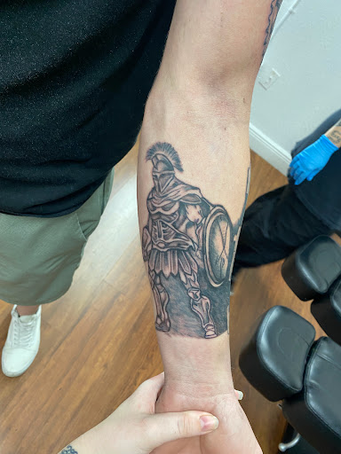 Explore tribal half sleeve tattoo ideas, creative tattoo ideas in Cocoa, available at Rorschach Tattoo Shop and Piercing Studio