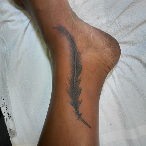 Explore neck tattoo ideas for woman, creative tattoo ideas in Albany, available at Modern Body Art