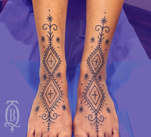 Explore cover up tattoo ideas black, creative tattoo ideas in Marietta, available at The Queen Bee Tattoo and Piercing Parlour