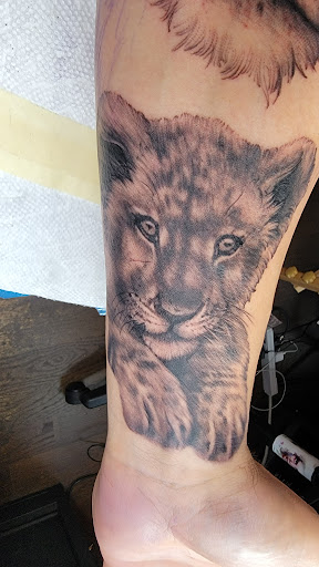 Explore cover up neck tattoo ideas, creative tattoo ideas in Baldwin, available at Salvation Tattoo