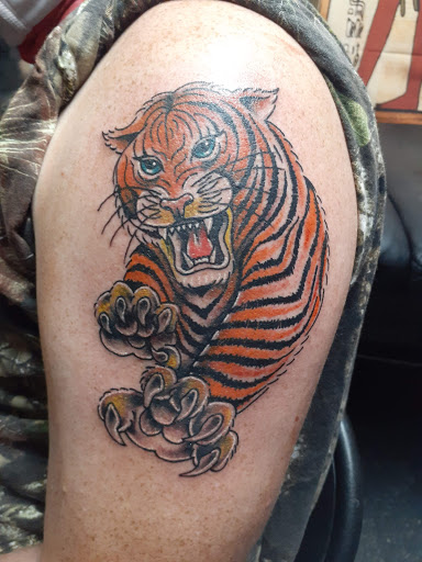 Explore black out tattoo ideas, creative tattoo ideas in Gastonia, available at Ink Link Tattoos