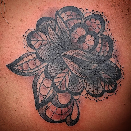 Explore motherhood tattoo ideas, creative tattoo ideas in Gadsden, available at Sacred Art Tattoo Company