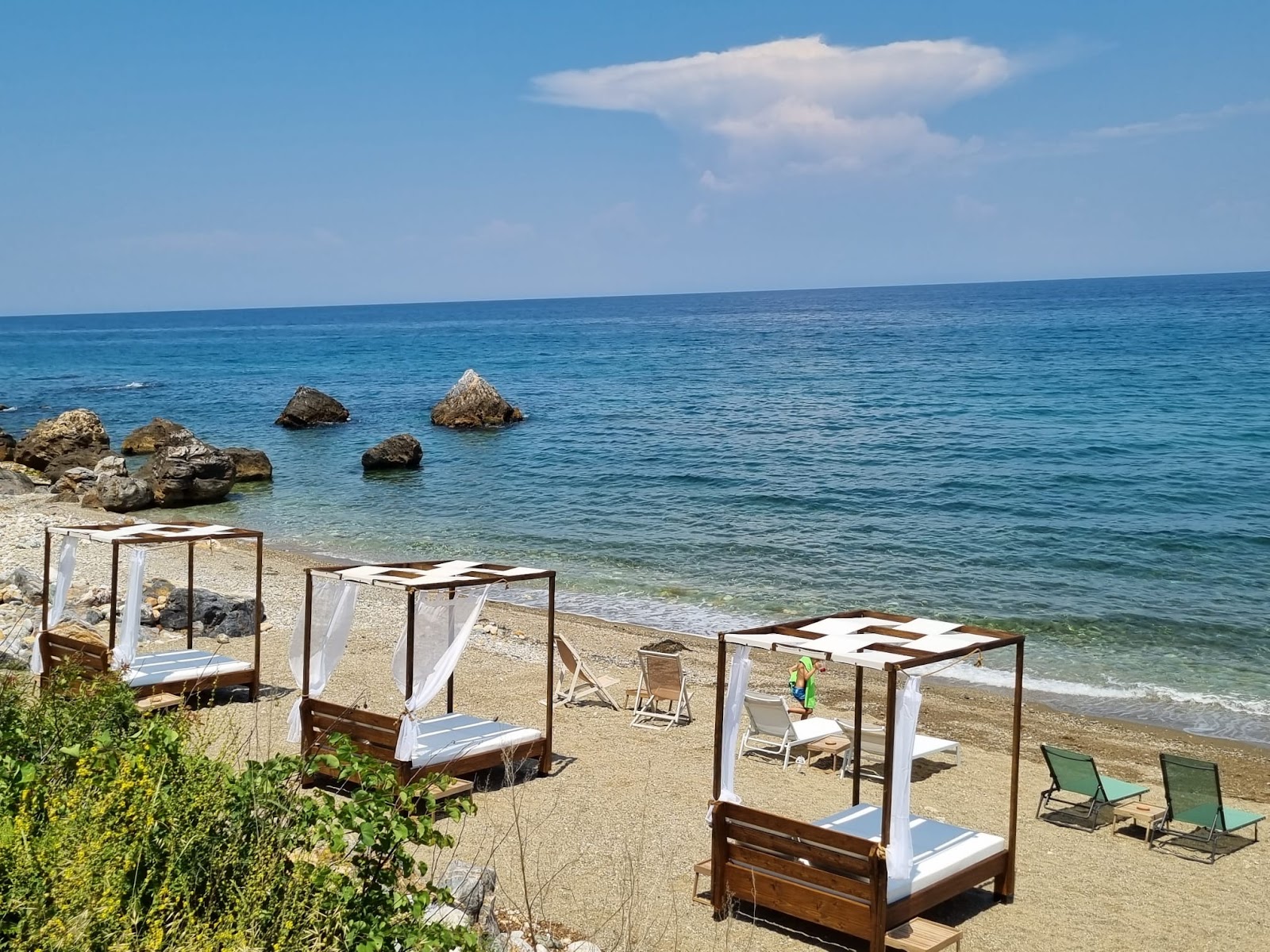 Kalivi Beach'in fotoğrafı düz bir kıyı şeridi ile birlikte