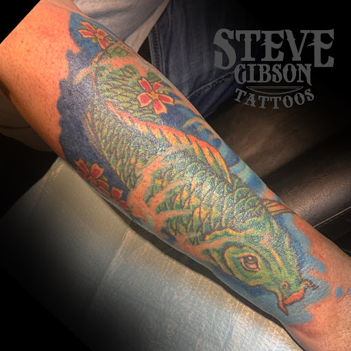 Explore back tattoo ideas male, creative tattoo ideas in Bridgeport, available at Pike Street Studios Tattoo and Body Piercing