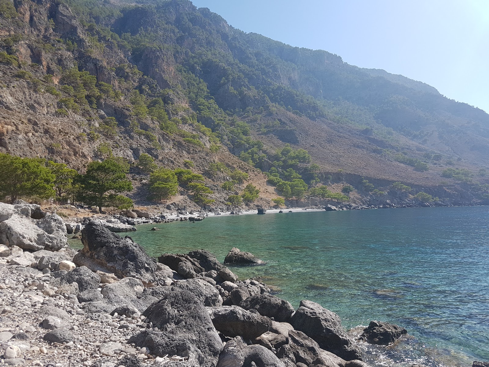 Foto von Bed Sheet beach mit türkisfarbenes wasser Oberfläche