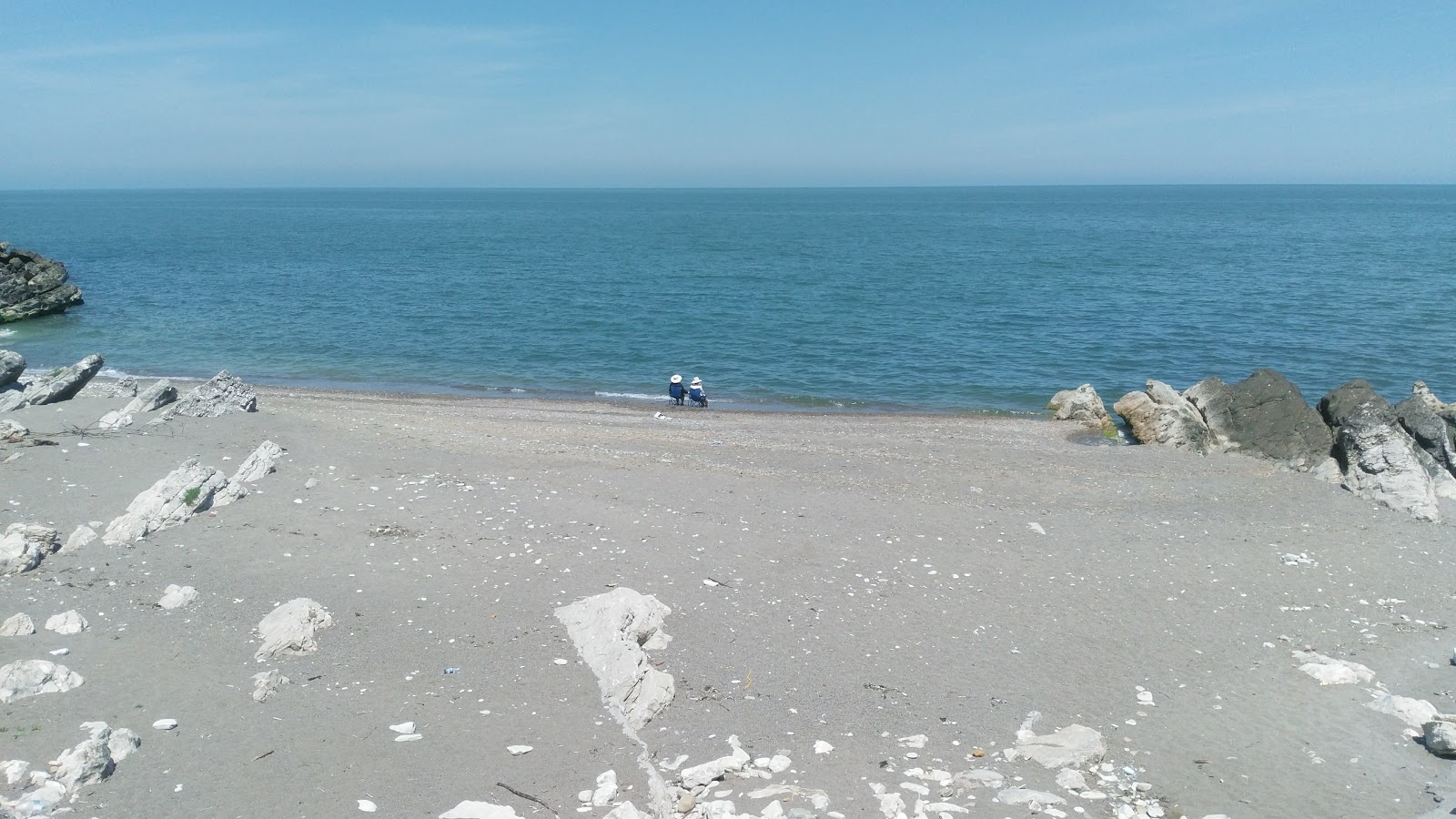 Fotografija Kadinlar Plaji z siv pesek površino