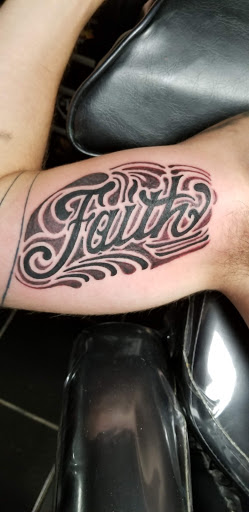 Explore arm blackout tattoo ideas, creative tattoo ideas in Erie, available at EliKingInk